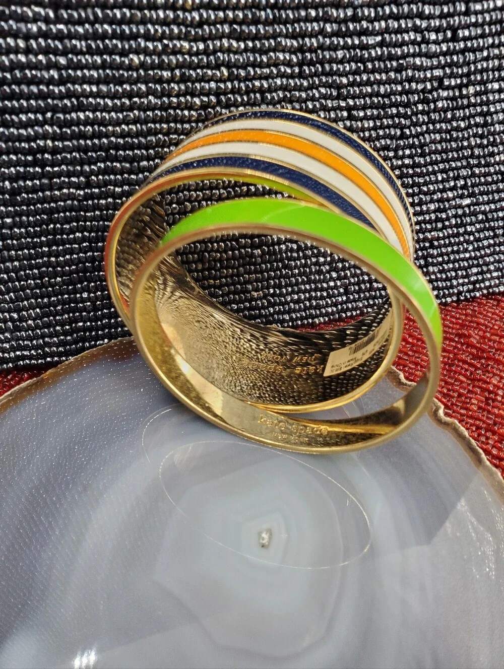 Two vibrant enamel and gold-plated bangle bracelets from Kate Spade New York. - Picture 5 of 17